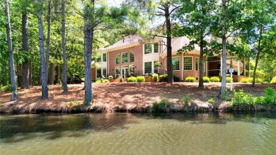 Welcome to 2812 Lawnes Creek, a handsome .7 Ac lakefront home on Two Rivers Country Club in Virginia - for sale on GolfHomes.com, golf home, golf lot