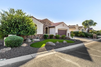 Classy Treviso home presenting curb appeal that makes you want on Tuscany Falls At Pebble Creek in Arizona - for sale on GolfHomes.com, golf home, golf lot