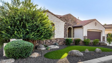 Classy Treviso home presenting curb appeal that makes you want on Tuscany Falls At Pebble Creek in Arizona - for sale on GolfHomes.com, golf home, golf lot
