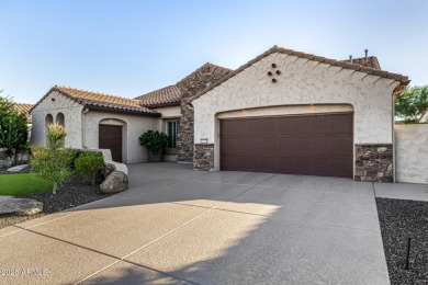 Classy Treviso home presenting curb appeal that makes you want on Tuscany Falls At Pebble Creek in Arizona - for sale on GolfHomes.com, golf home, golf lot