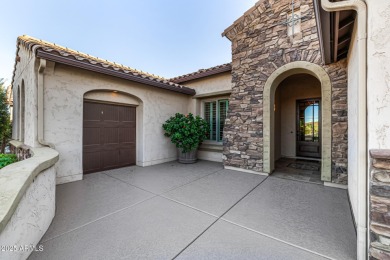 Classy Treviso home presenting curb appeal that makes you want on Tuscany Falls At Pebble Creek in Arizona - for sale on GolfHomes.com, golf home, golf lot