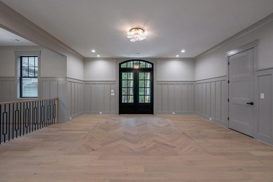 New Construction Masterpiece, nestled on Hole #1 of The Cove in on Reynolds Lake Oconee - The Oconee in Georgia - for sale on GolfHomes.com, golf home, golf lot