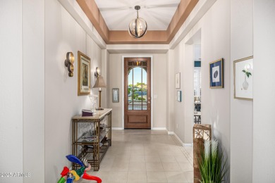 Classy Treviso home presenting curb appeal that makes you want on Tuscany Falls At Pebble Creek in Arizona - for sale on GolfHomes.com, golf home, golf lot