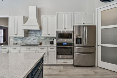 One or more photo(s) has been virtually staged. **A Modern on River Wilderness Golf and Country Club in Florida - for sale on GolfHomes.com, golf home, golf lot