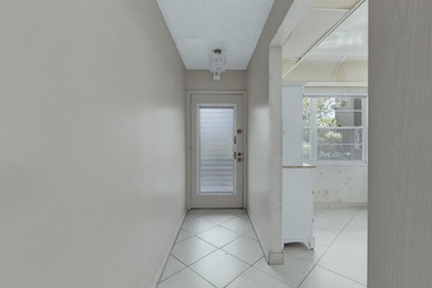 Welcome to resort-style living in the highly desirable Antigua on Wynmoor Golf Course in Florida - for sale on GolfHomes.com, golf home, golf lot