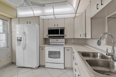 Welcome to resort-style living in the highly desirable Antigua on Wynmoor Golf Course in Florida - for sale on GolfHomes.com, golf home, golf lot