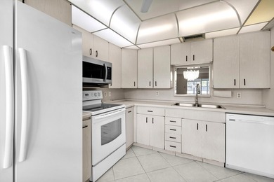 Welcome to resort-style living in the highly desirable Antigua on Wynmoor Golf Course in Florida - for sale on GolfHomes.com, golf home, golf lot