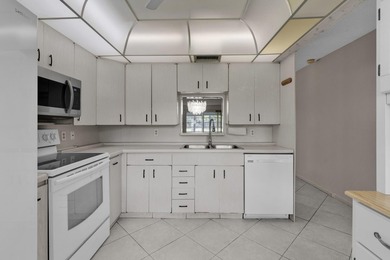 Welcome to resort-style living in the highly desirable Antigua on Wynmoor Golf Course in Florida - for sale on GolfHomes.com, golf home, golf lot