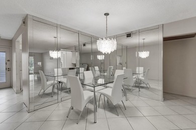 Welcome to resort-style living in the highly desirable Antigua on Wynmoor Golf Course in Florida - for sale on GolfHomes.com, golf home, golf lot