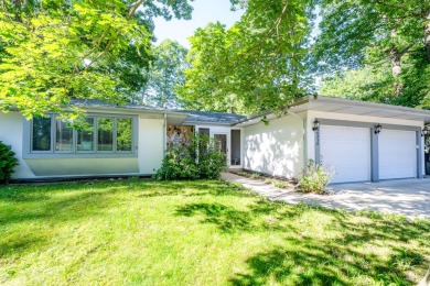 Nestled in the heart of Harbor Country, this 4 bedroom Grand on Grand Beach Municipal Golf Course in Michigan - for sale on GolfHomes.com, golf home, golf lot