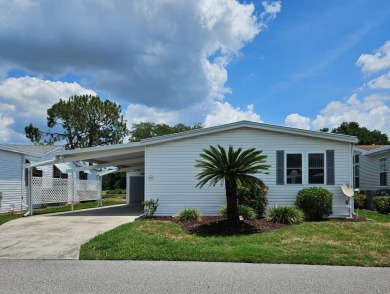 This home is on leased land, meaning buyers do not own the land on Big Cypress Golf and Country Club in Florida - for sale on GolfHomes.com, golf home, golf lot