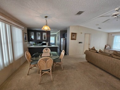 This home is on leased land, meaning buyers do not own the land on Big Cypress Golf and Country Club in Florida - for sale on GolfHomes.com, golf home, golf lot