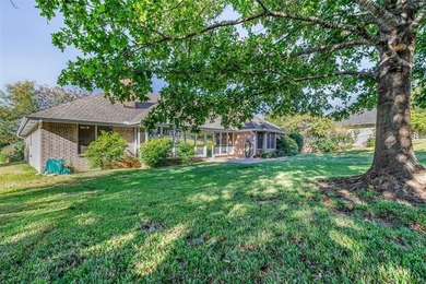 NEAT AS A PIN 3-2.5-2 home with golf cart garage located on on Pecan Plantation Country Club in Texas - for sale on GolfHomes.com, golf home, golf lot