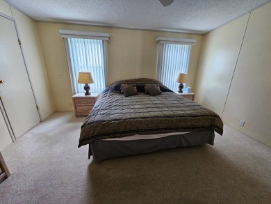 This home is on leased land, meaning buyers do not own the land on Big Cypress Golf and Country Club in Florida - for sale on GolfHomes.com, golf home, golf lot