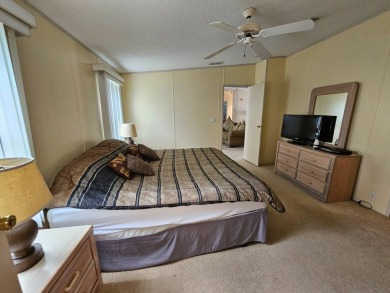 This home is on leased land, meaning buyers do not own the land on Big Cypress Golf and Country Club in Florida - for sale on GolfHomes.com, golf home, golf lot
