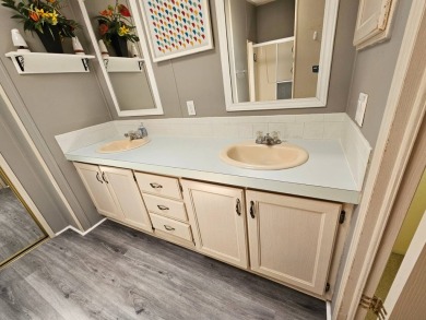 This home is on leased land, meaning buyers do not own the land on Big Cypress Golf and Country Club in Florida - for sale on GolfHomes.com, golf home, golf lot