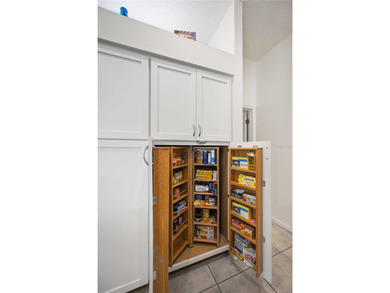 Step into this exceptional 4-bedroom, 2.5-bath pool home on The Venice Golf and Country Club in Florida - for sale on GolfHomes.com, golf home, golf lot