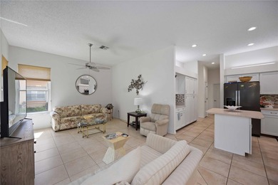 Step into this exceptional 4-bedroom, 2.5-bath pool home on The Venice Golf and Country Club in Florida - for sale on GolfHomes.com, golf home, golf lot