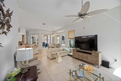 Step into this exceptional 4-bedroom, 2.5-bath pool home on The Venice Golf and Country Club in Florida - for sale on GolfHomes.com, golf home, golf lot