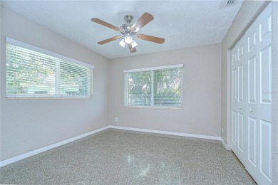 Charming Mid-Century Home on a Spacious Corner Lot in Pasadena on Pasadena Yacht and Country Club in Florida - for sale on GolfHomes.com, golf home, golf lot