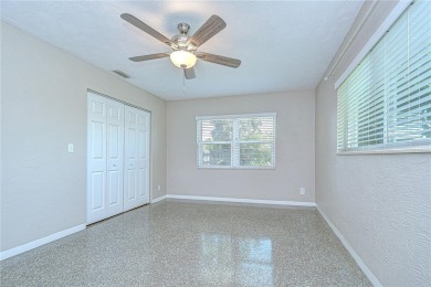 Charming Mid-Century Home on a Spacious Corner Lot in Pasadena on Pasadena Yacht and Country Club in Florida - for sale on GolfHomes.com, golf home, golf lot