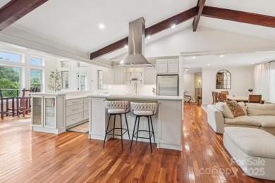 Hollywood glam meets the mountains at 193 Gateway Drive in on Rumbling Bald Resort on Lake Lure in North Carolina - for sale on GolfHomes.com, golf home, golf lot