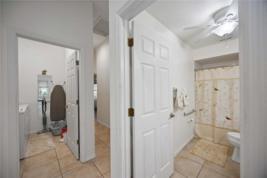 Step into this exceptional 4-bedroom, 2.5-bath pool home on The Venice Golf and Country Club in Florida - for sale on GolfHomes.com, golf home, golf lot