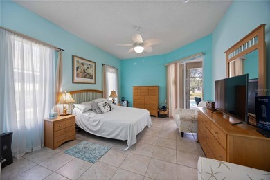 Step into this exceptional 4-bedroom, 2.5-bath pool home on The Venice Golf and Country Club in Florida - for sale on GolfHomes.com, golf home, golf lot