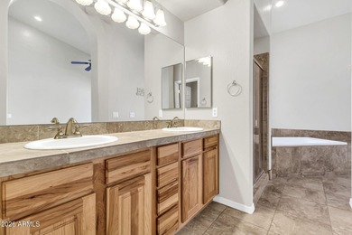 Welcome to this beautifully maintained home in the gated Fairway on Gold Canyon Golf Resort - Sidewinder in Arizona - for sale on GolfHomes.com, golf home, golf lot