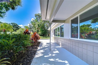 Charming Mid-Century Home on a Spacious Corner Lot in Pasadena on Pasadena Yacht and Country Club in Florida - for sale on GolfHomes.com, golf home, golf lot