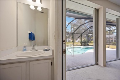 Step into this exceptional 4-bedroom, 2.5-bath pool home on The Venice Golf and Country Club in Florida - for sale on GolfHomes.com, golf home, golf lot