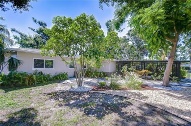 Charming Mid-Century Home on a Spacious Corner Lot in Pasadena on Pasadena Yacht and Country Club in Florida - for sale on GolfHomes.com, golf home, golf lot