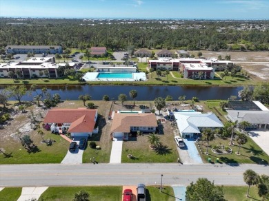 This fully furnished, three-bedroom, three-bathroom waterfront on Rotonda Golf and Country Club The Hills Course in Florida - for sale on GolfHomes.com, golf home, golf lot