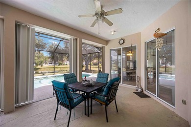 Step into this exceptional 4-bedroom, 2.5-bath pool home on The Venice Golf and Country Club in Florida - for sale on GolfHomes.com, golf home, golf lot