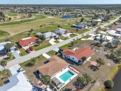 This fully furnished, three-bedroom, three-bathroom waterfront on Rotonda Golf and Country Club The Hills Course in Florida - for sale on GolfHomes.com, golf home, golf lot