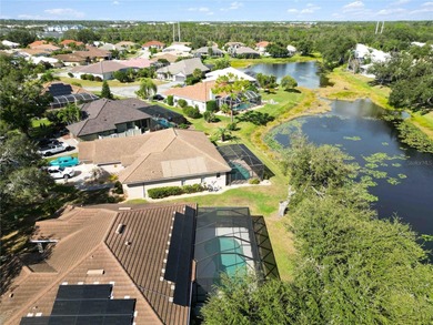 Step into this exceptional 4-bedroom, 2.5-bath pool home on The Venice Golf and Country Club in Florida - for sale on GolfHomes.com, golf home, golf lot
