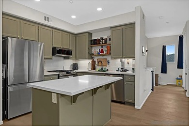 Experience elevated living in this luxury condo showcasing on Cottonwood Golf Club in California - for sale on GolfHomes.com, golf home, golf lot