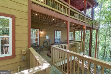 Quentisential Mountain Cabin, currently a great producer for STR on Innsbruck Resort and Golf Club in Georgia - for sale on GolfHomes.com, golf home, golf lot