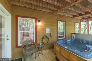 Quentisential Mountain Cabin, currently a great producer for STR on Innsbruck Resort and Golf Club in Georgia - for sale on GolfHomes.com, golf home, golf lot