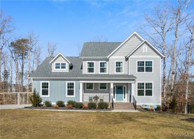 Step into this like-new home at 18030 Creek Cove Drive, where on The Westham Golf Club At Magnolia Green in Virginia - for sale on GolfHomes.com, golf home, golf lot