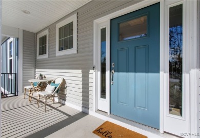 Step into this like-new home at 18030 Creek Cove Drive, where on The Westham Golf Club At Magnolia Green in Virginia - for sale on GolfHomes.com, golf home, golf lot