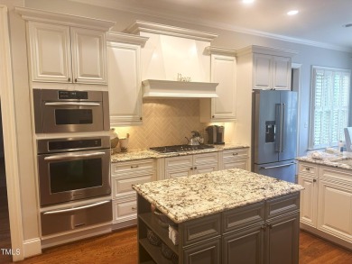 Corner Lot .57 Acres. Spacious home in the golf community of on Heritage Golf Club in North Carolina - for sale on GolfHomes.com, golf home, golf lot