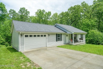Welcome to this beautifully maintained 2022 home located in the on Lake Tansi Village Country Club in Tennessee - for sale on GolfHomes.com, golf home, golf lot