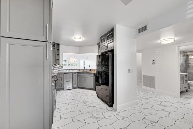Beautifully updated 3 bedroom, 2 bath first-floor corner condo on Sunrise Lakes Phase IV Golf Course in Florida - for sale on GolfHomes.com, golf home, golf lot