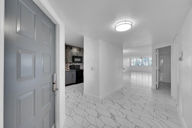 Beautifully updated 3 bedroom, 2 bath first-floor corner condo on Sunrise Lakes Phase IV Golf Course in Florida - for sale on GolfHomes.com, golf home, golf lot