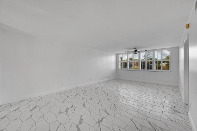 Beautifully updated 3 bedroom, 2 bath first-floor corner condo on Sunrise Lakes Phase IV Golf Course in Florida - for sale on GolfHomes.com, golf home, golf lot