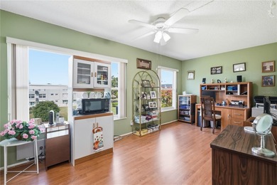 Welcome to this light and bright two-bedroom, two-bathroom condo on On Top Of The World Golf Course in Florida - for sale on GolfHomes.com, golf home, golf lot