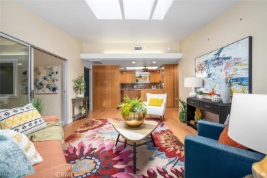 Nestled behind mature trees, this charming home offers a serene on Leisure World Seal Beach Golf Course in California - for sale on GolfHomes.com, golf home, golf lot