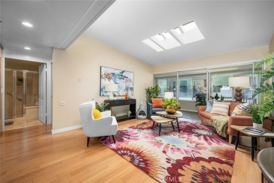 Nestled behind mature trees, this charming home offers a serene on Leisure World Seal Beach Golf Course in California - for sale on GolfHomes.com, golf home, golf lot