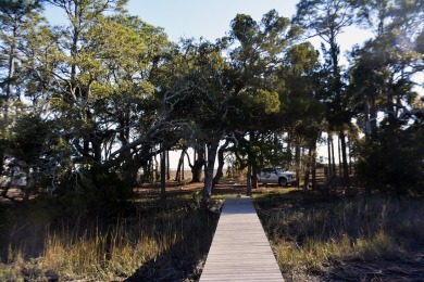 Best of the best! Rare creek front with dock on one side and on The Plantation Course At Edisto in South Carolina - for sale on GolfHomes.com, golf home, golf lot